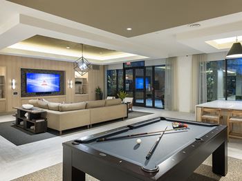 Resident clubhouse with smart tv lounge and billiards